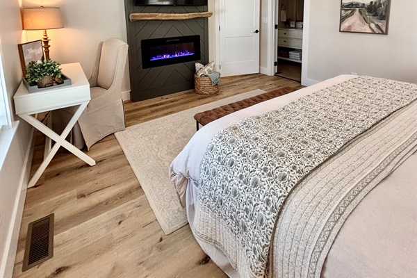 Smart TV and fireplace for the coziest vibes in this Master suite.  You'll never want to leave!