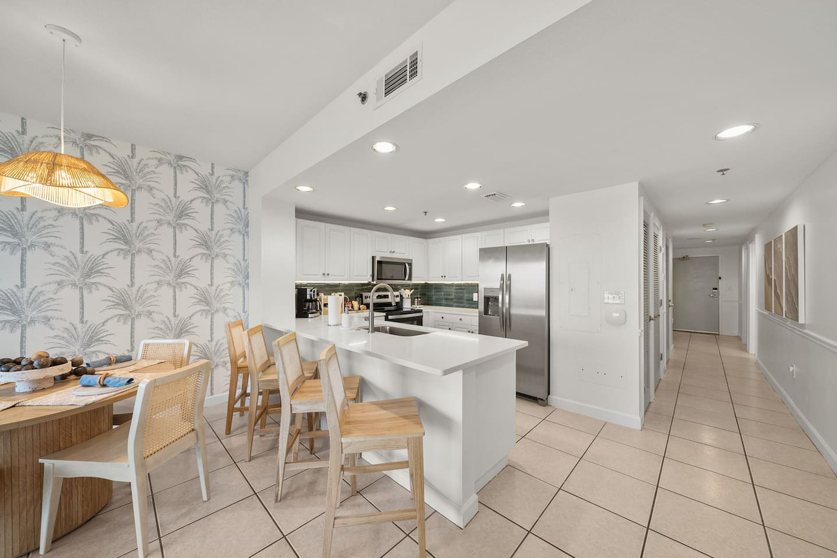 Down the hall you'll find the dedicated closet for all beach essentials and laundry closet containing washer and dryer.  Iron and clothes steamer also available for use.  Laundry detergent provided.