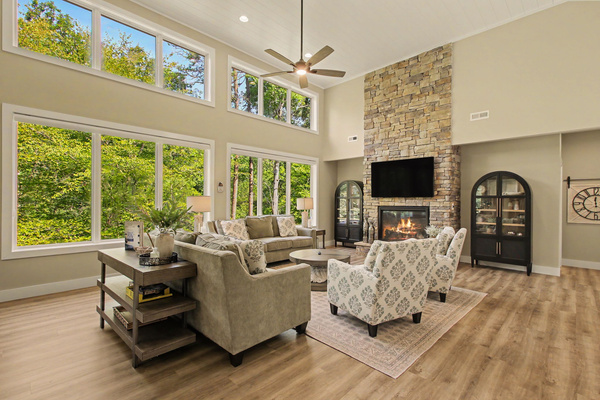 Great room seating area, fireplace, and TV