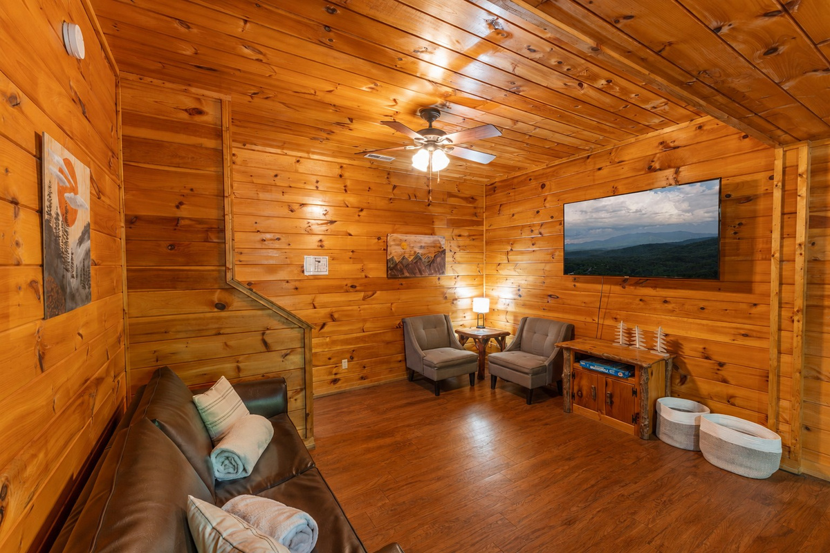 Enjoy the perfect location for movie night or watching the game while playing games.