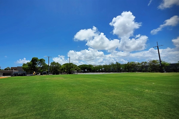 Floranada Park directly across the street with large green space, baseball field, basketball & sand volleyball courts