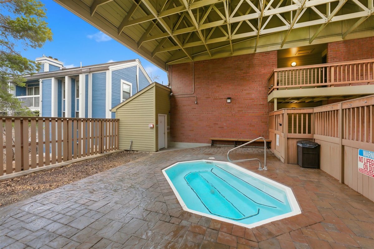 Hot tub area located right next to the unit.