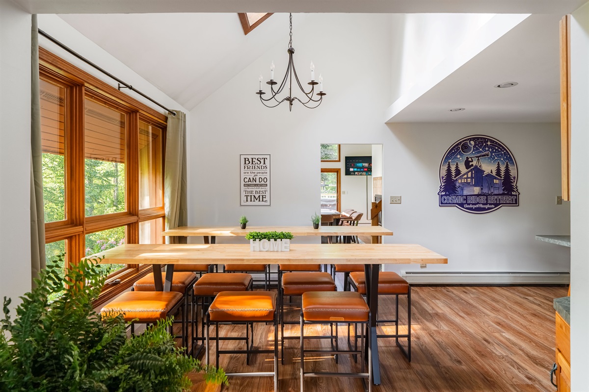 Gather the whole group for meals or game nights around the spacious farmhouse-style table.