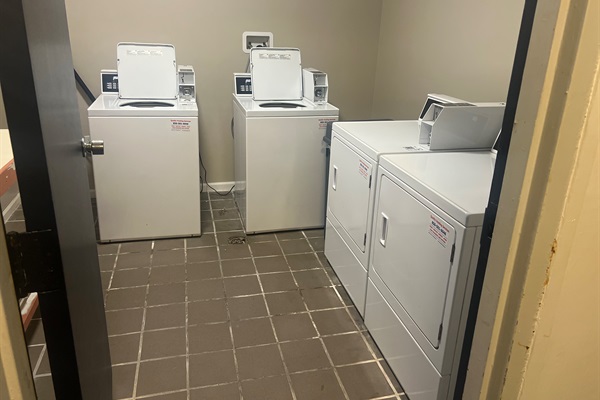 Coin Laundry Located just 4 doors down hallway.