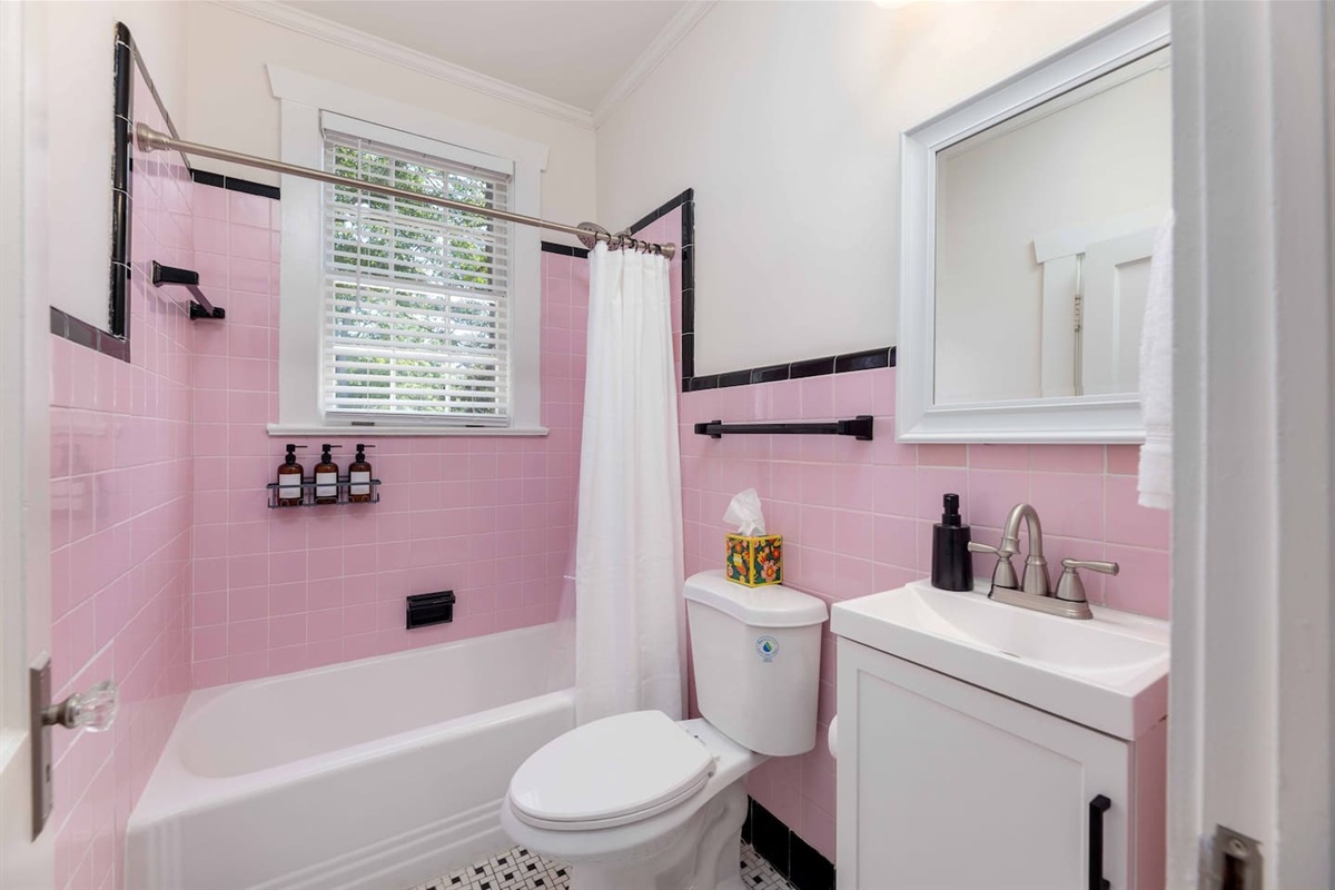 Fully stocked mid-century bathroom that is fully stocked