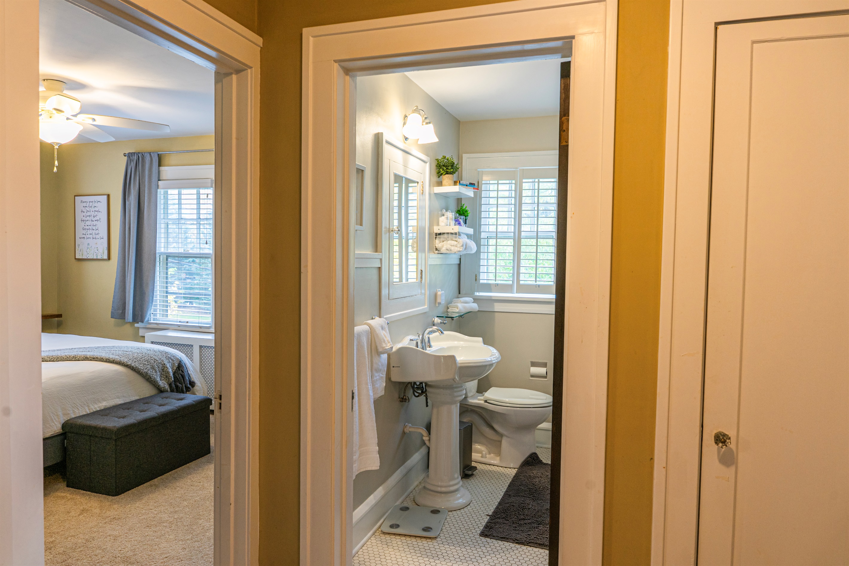 Full bath, upstairs, conveniently located near all three upstairs bedrooms.
