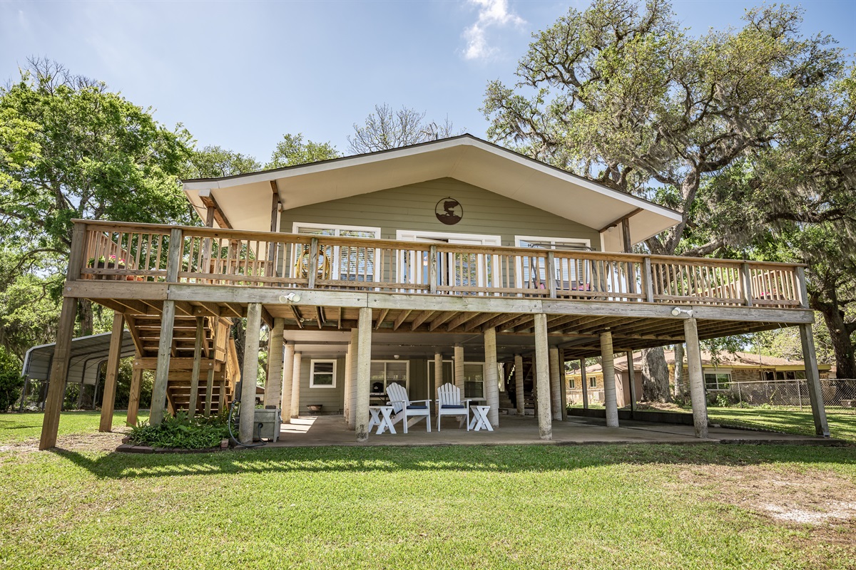Relax upstairs or under the house! Lots of different seating areas to choose from!