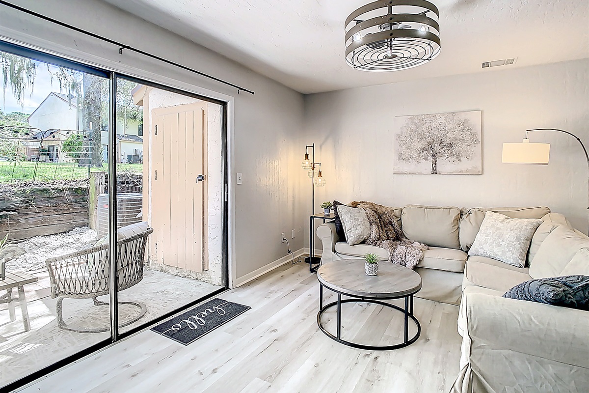 Elegant living room with contemporary styling, comfortable sectional sofa, and modern decor creating a welcoming atmosphere.