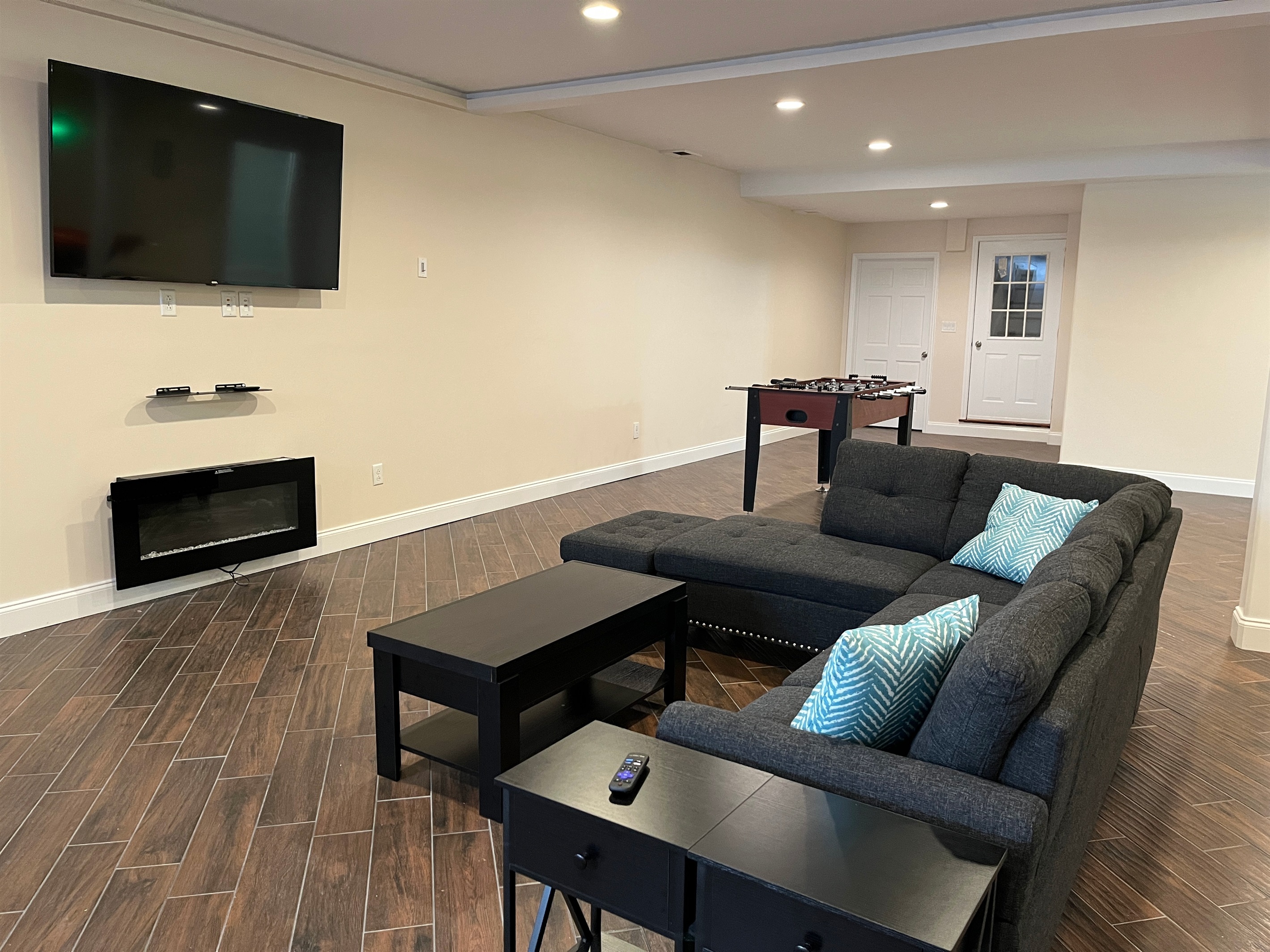 Cozy seating in lower level gameroom