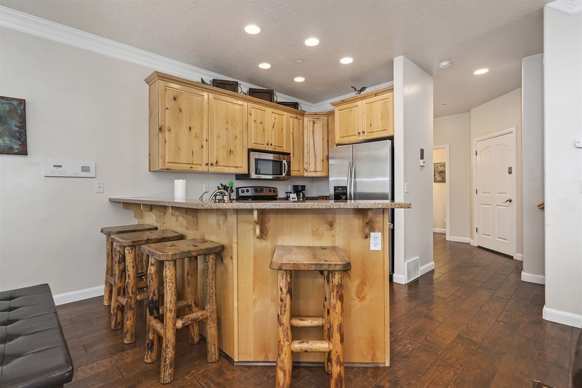 A chef-friendly kitchen with bar seating for four, offering the perfect blend of functionality and social connection.