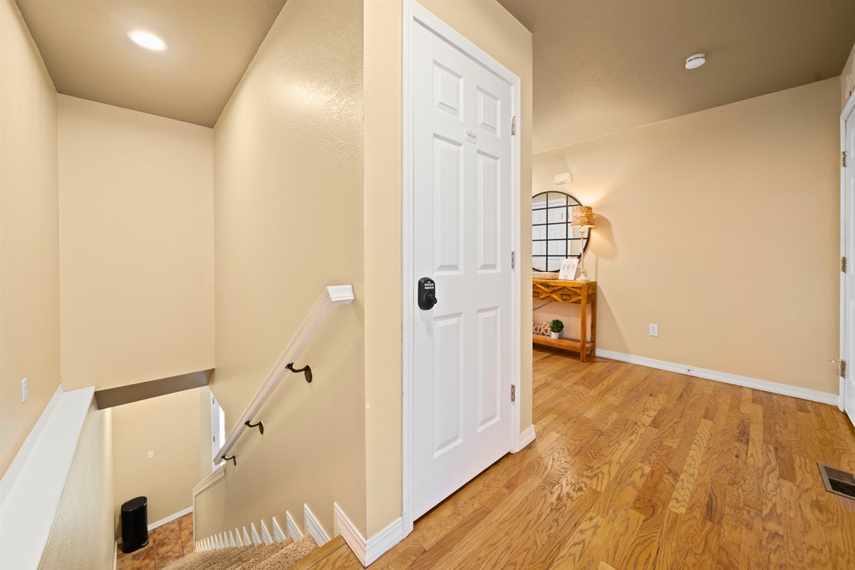 The landing area helps the home flow naturally and provides easy access to both levels without breaking up the openness.