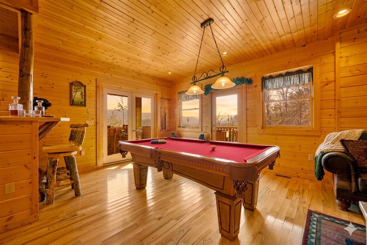 Challenge friends to a round of pool while soaking in the beautiful mountain scenery just beyond the windows. A fun-filled space where laughter and friendly competition come naturally.