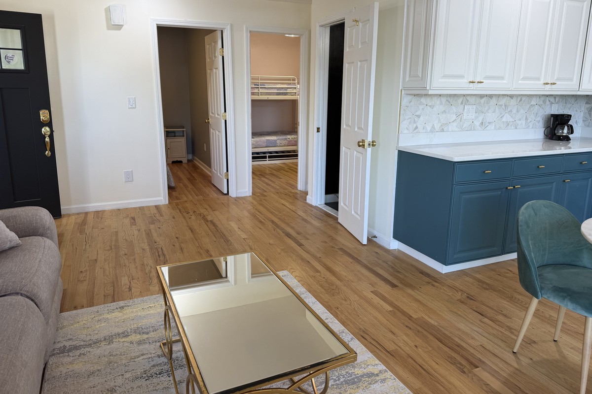 Living area with bedrooms and bathroom beyond