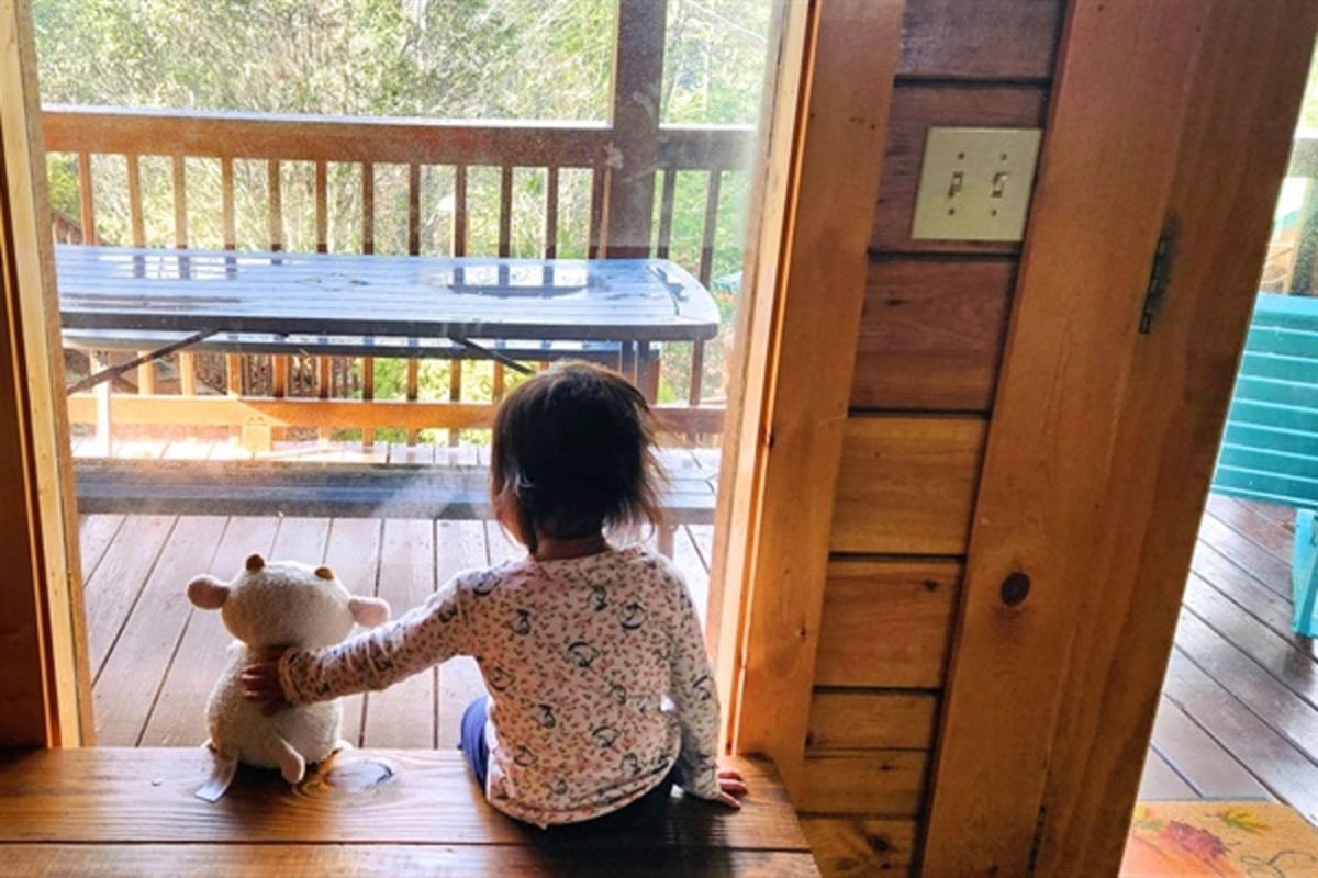 Pause and savor quiet moments on the porch where kids slow down and simple joys shine.