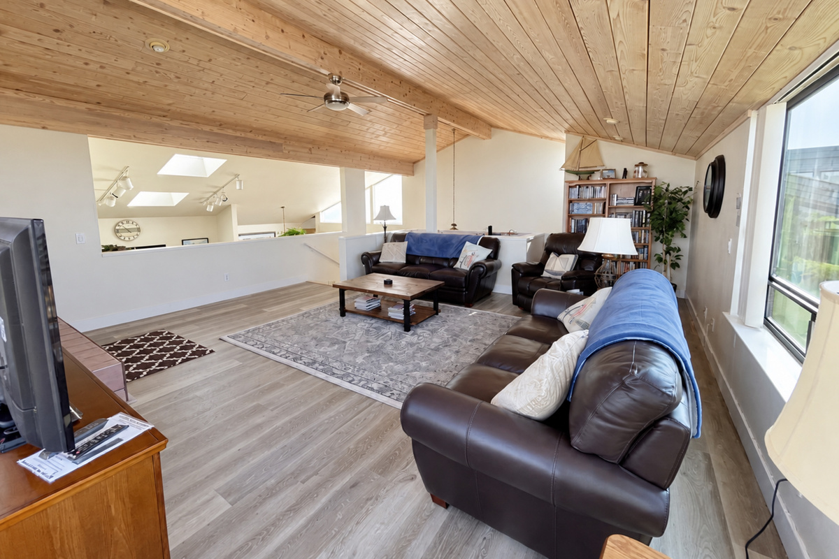 Living Room with Leather couches/chair. Large seating area.