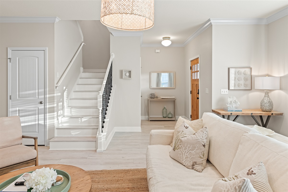 Living Room #1: A wide-angle view showing the expansive and welcoming layout of the main social hub.