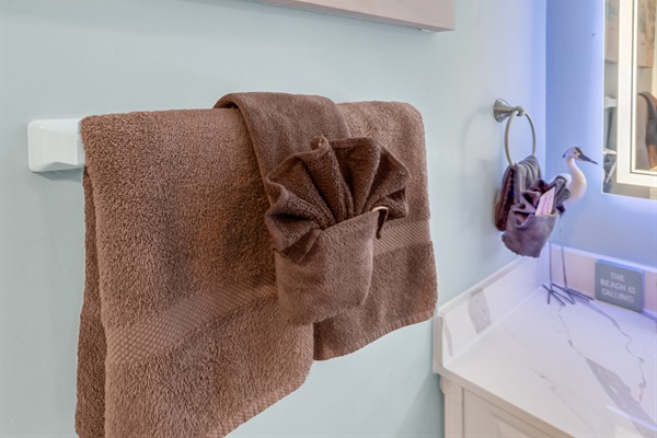 Bathroom stocked with plush towels for your stay