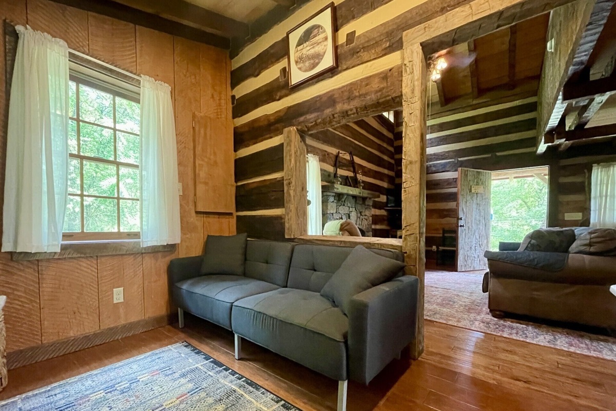 This small couch reclines into a sleeping area