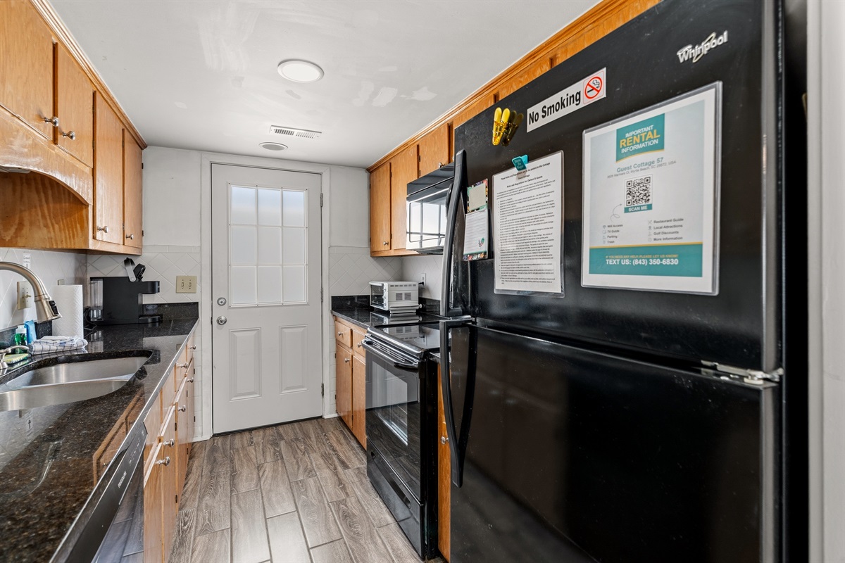 Kitchen-- fully stocked galley style
