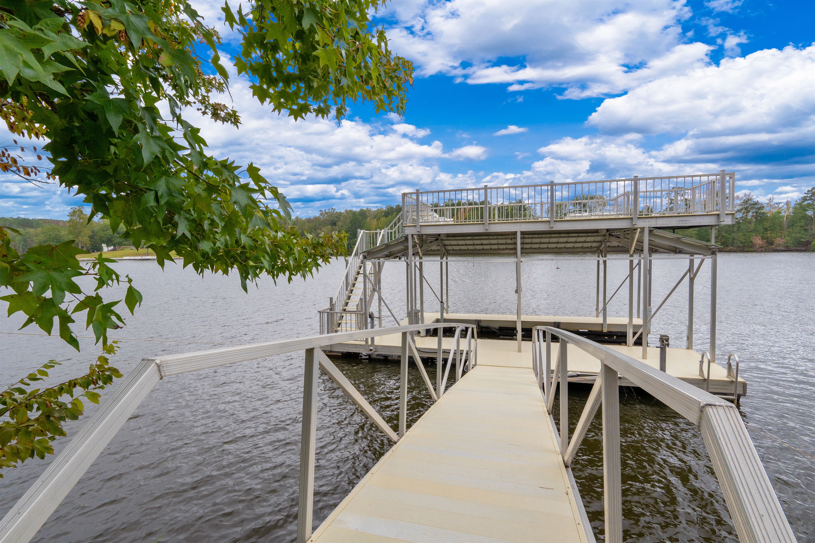 Enjoy the floating dock with a spacious sundeck, perfect for lounging in the sun, swimming, or tying up your boat for a day on the water.