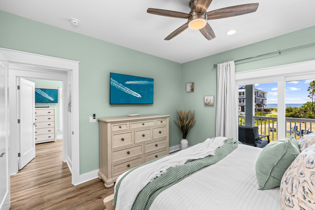 Wake up to peaceful Gulf views from the King suite, then step onto the shared balcony to enjoy your morning coffee.
