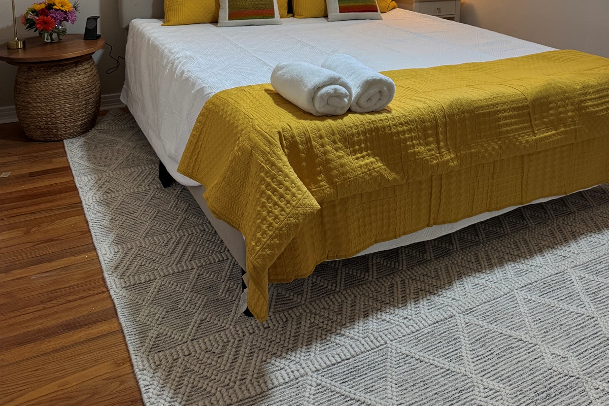 King sized bed is perfect for rest - we have the best pillows and bedding! 