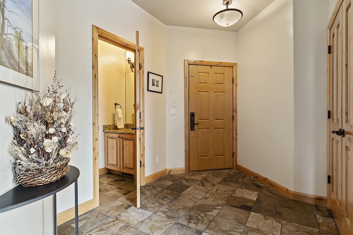 Welcoming entryway with elegant finishes, setting the tone for a refined and relaxing stay.