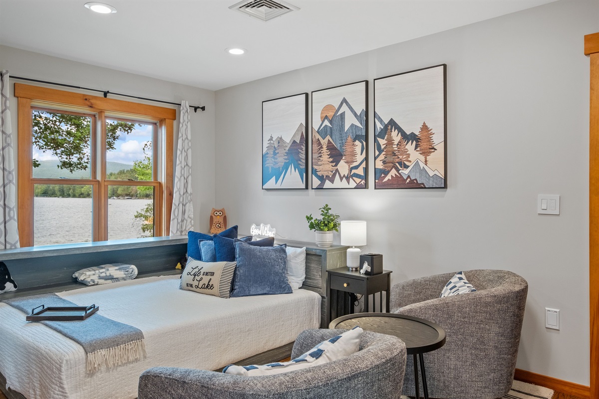 Second floor loft bedroom with queen bed and bath just outside the door