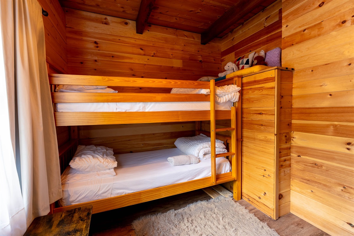 In this bedroom, you'll find one bunk bed, perfect for children! 
