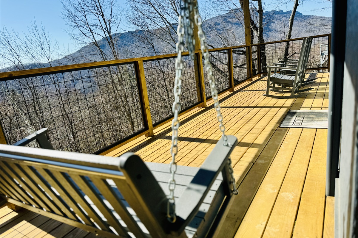 Porch Swinging & Rocking Chairs are so relaxing...especially with this seasonal "famous" Grandfather Mountain Profile View & the treehouse-feeling of our porches!