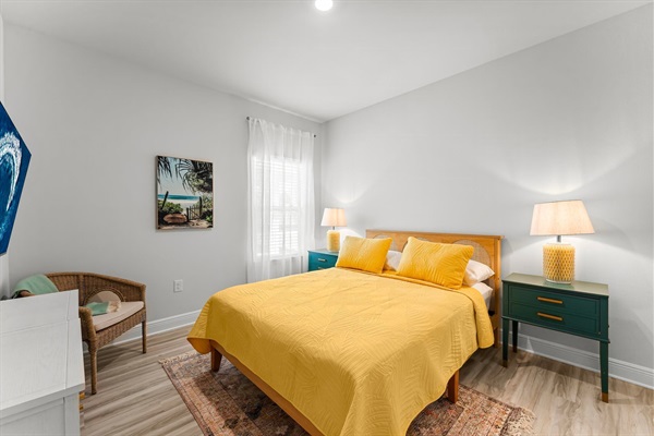 The surf room is bright and relaxing with a queen size bed