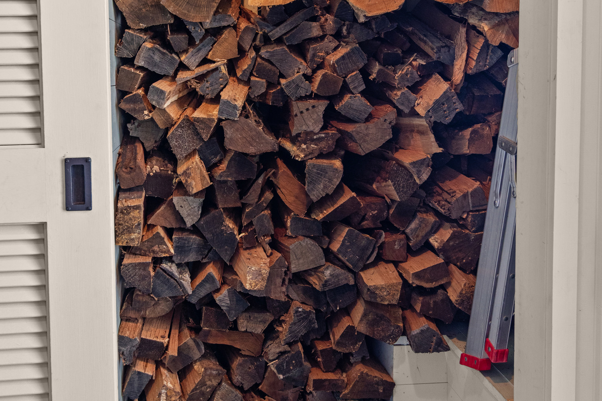 When cooler weather arrives, everything you need for a cozy fire is close at hand, with firewood conveniently stored just off the hallway.
