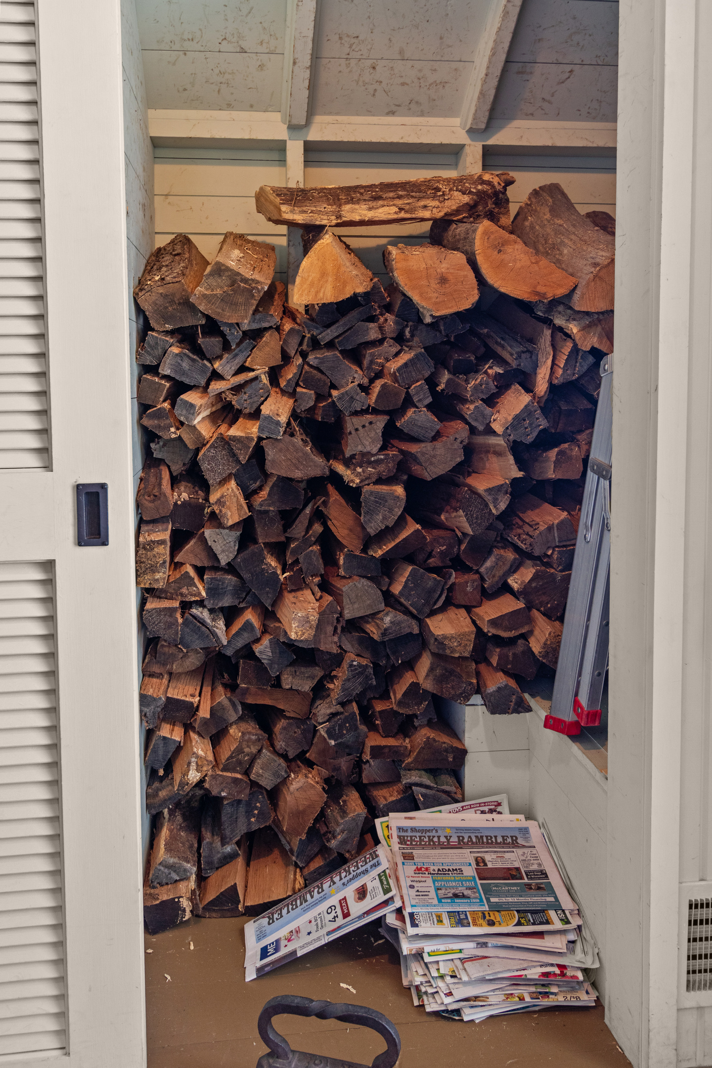 When cooler weather arrives, everything you need for a cozy fire is close at hand, with firewood conveniently stored just off the hallway.