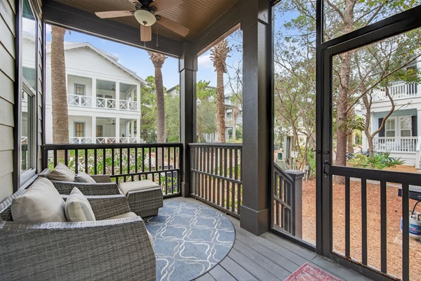 First floor screened-in porch lounging area