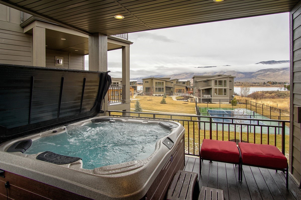 Private balcony hot tub—soak and unwind while taking in breathtaking mountain scenery.