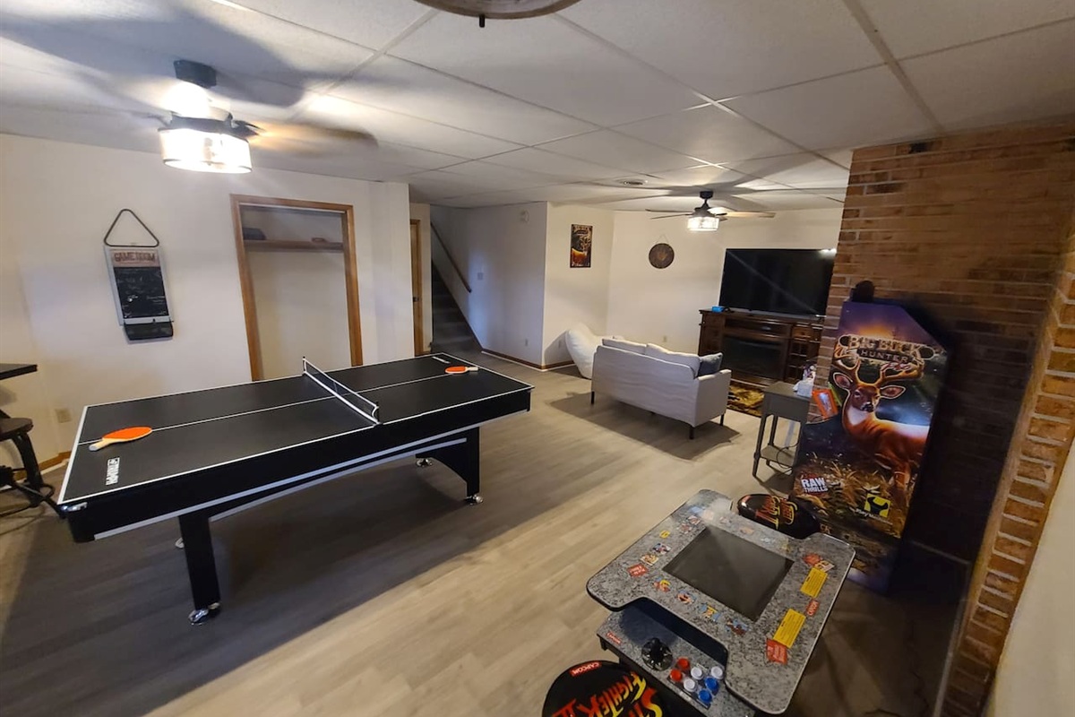 Game Room: Unwind with ping pong and vintage arcade fun in this spacious entertainment hub!