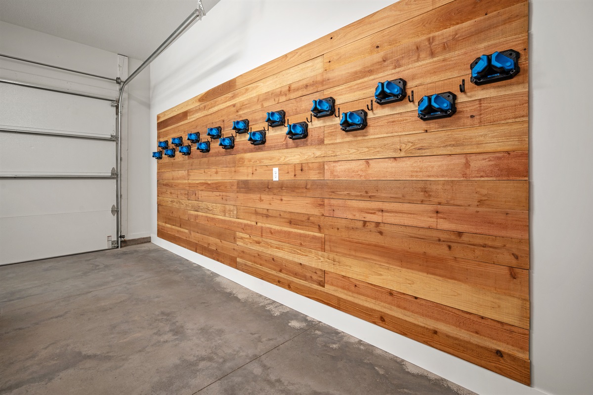 two-car garage features storage for 10–12 skis or snowboards plus a private tuning station to keep your gear in top shape