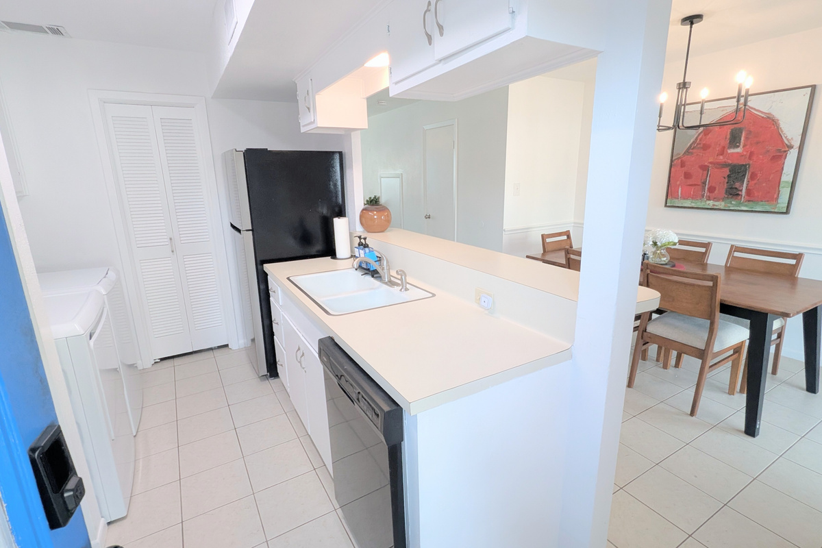 The galley kitchen also includes free access to the washer and dryer. 