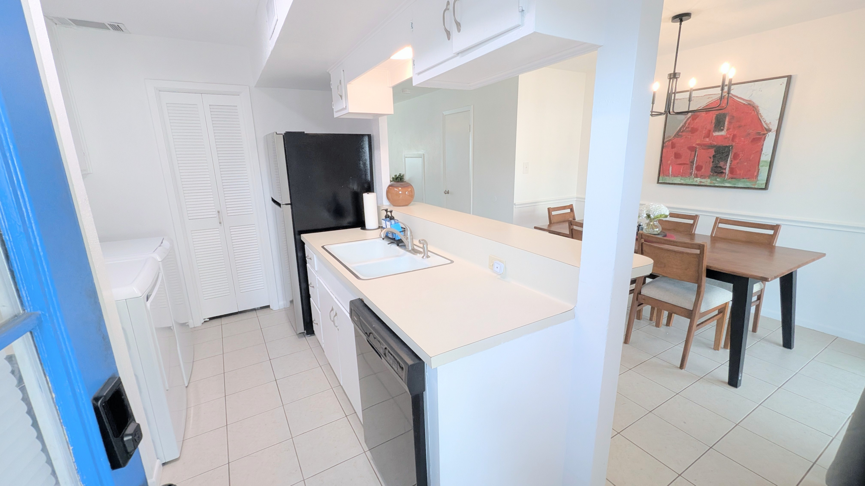 The galley kitchen also includes free access to the washer and dryer. 