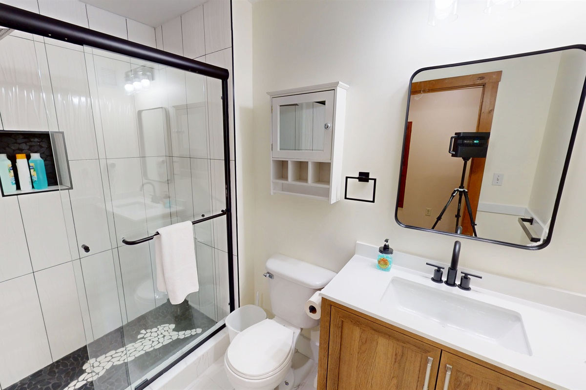 Ski-lodge tilework, fresh towels, and thoughtful touches.