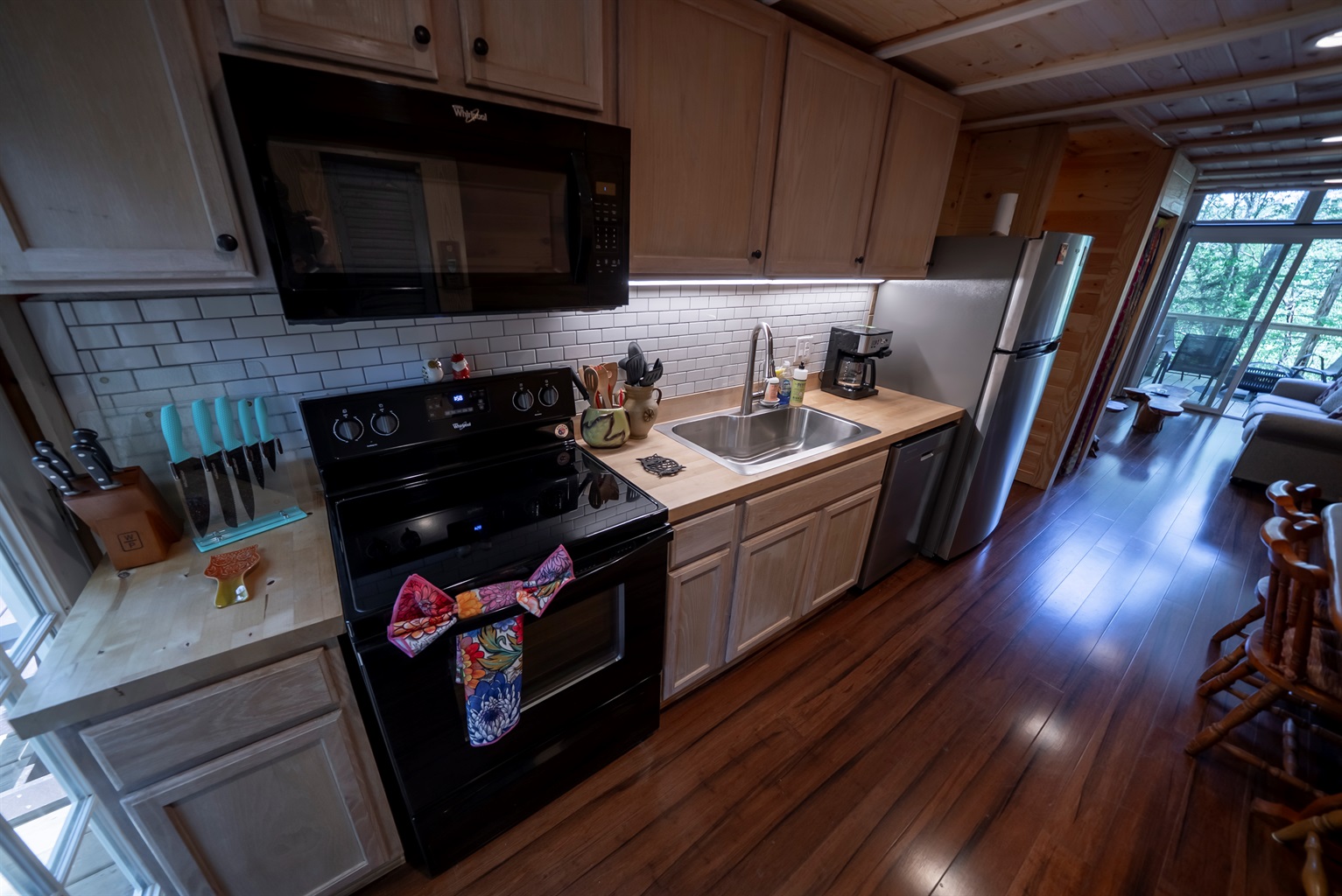 Bright, functional, and thoughtfully stocked—this kitchen makes it easy to cook, snack, or sip your morning coffee before heading out.