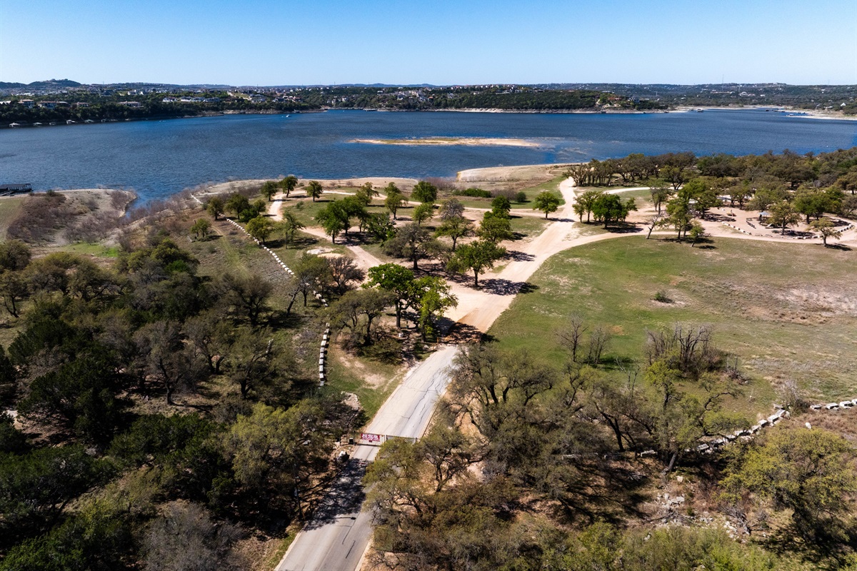 Point Venture Park, a gem of a location, boasts a private boat launch, a frisbee golf, volleyball, and basketball court play area, and seating areas. 