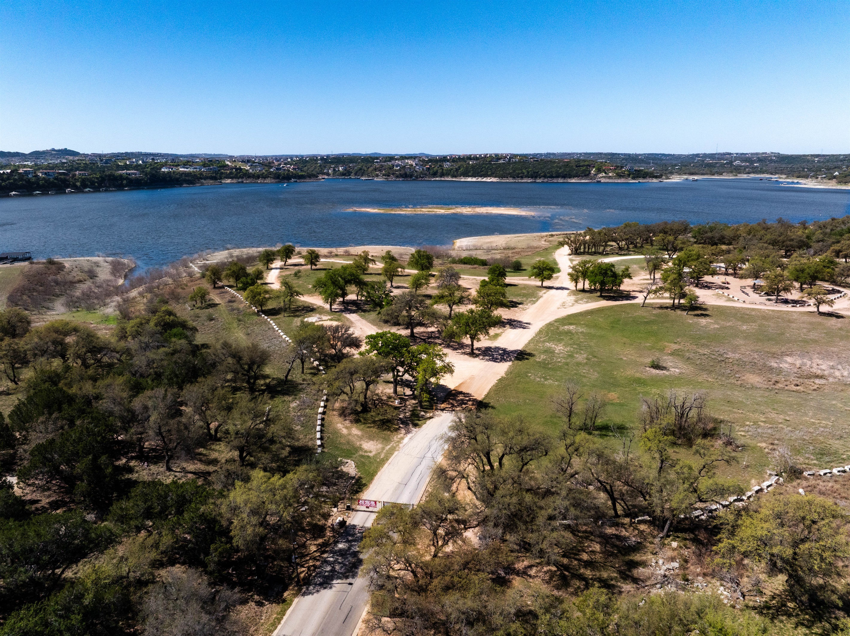 Point Venture Park, a gem of a location, boasts a private boat launch, a frisbee golf, volleyball, and basketball court play area, and seating areas. 