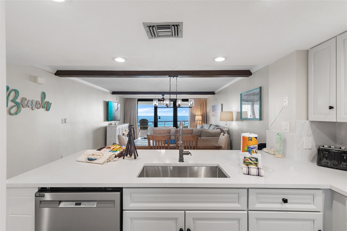 Newly Remodeled Kitchen with Quartz Countertops and all new stainless appliances + Gulf Views to enjoy while preparing meals! 