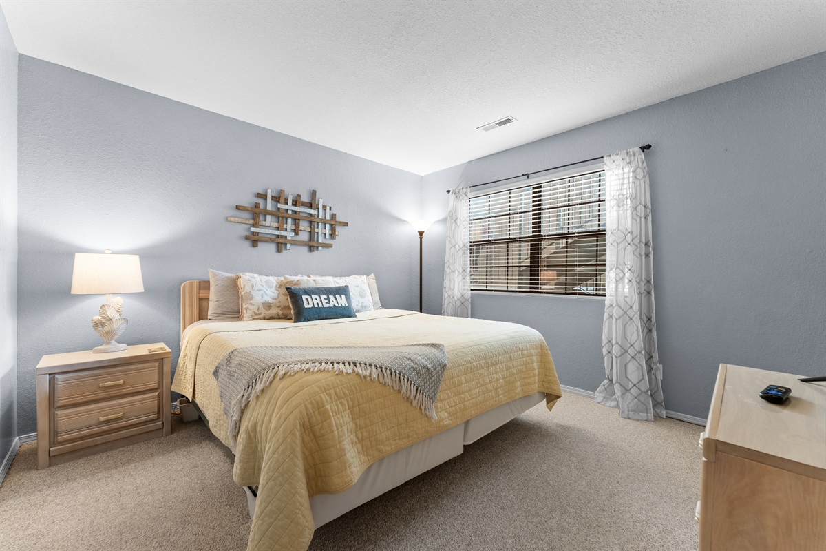 The second king bedroom gives another couple the same real-bed comfort—no one gets the lesser room.