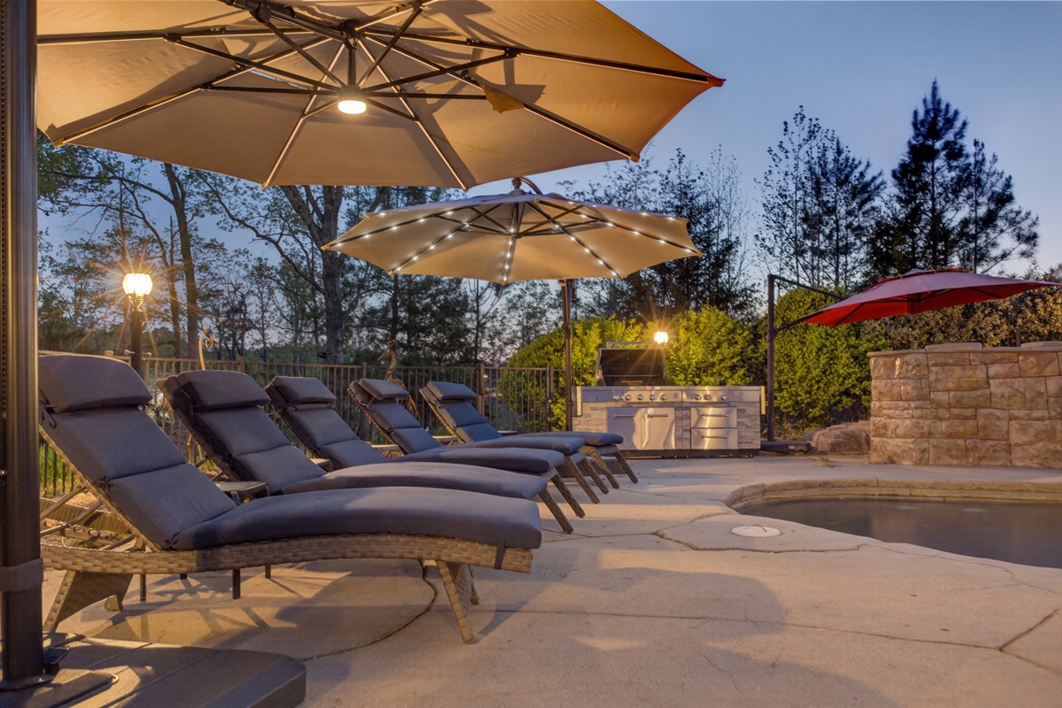 Lounge poolside under the evening sky