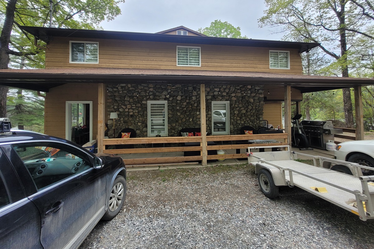 Covered front porch and parking
