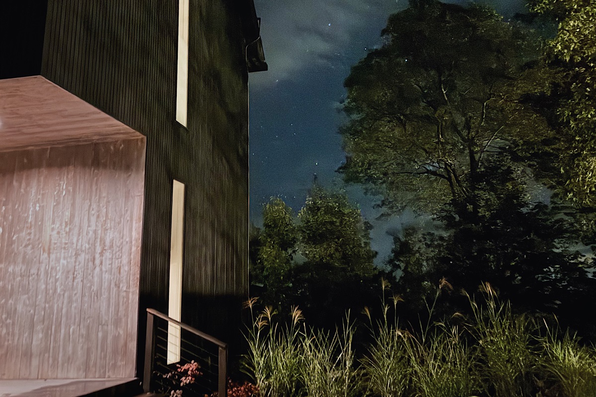 Lit entry, with heated stair pads for the winter months.