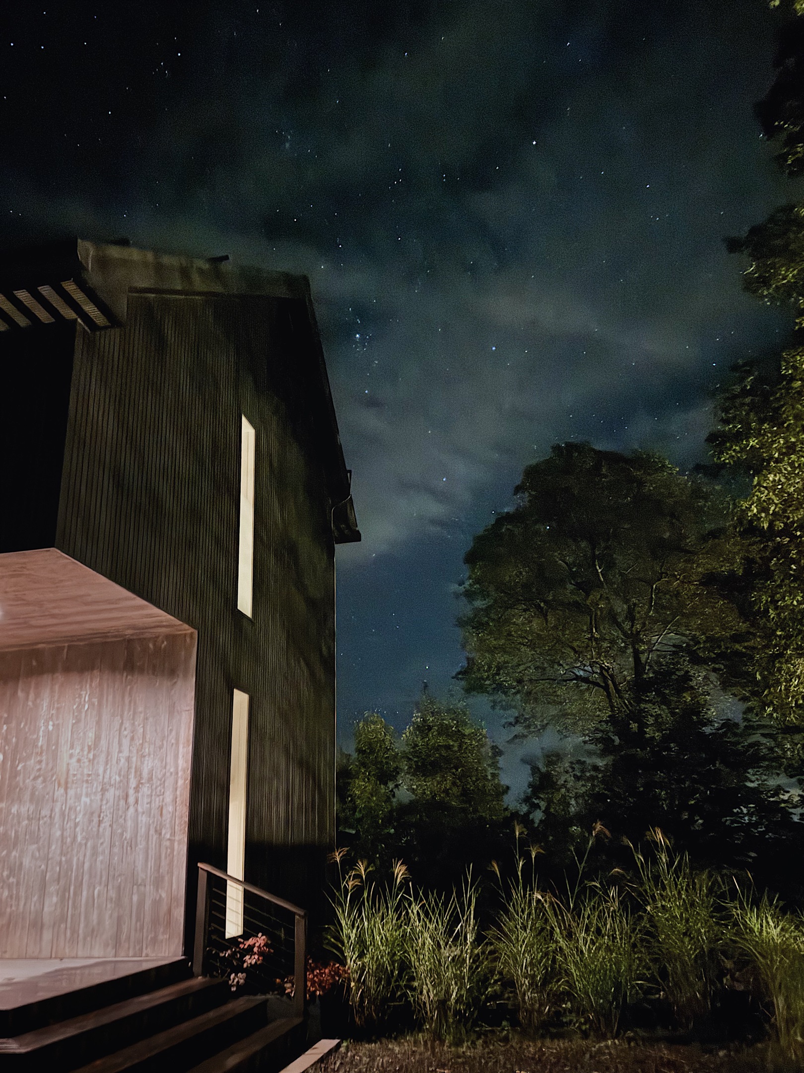 Lit entry, with heated stair pads for the winter months.