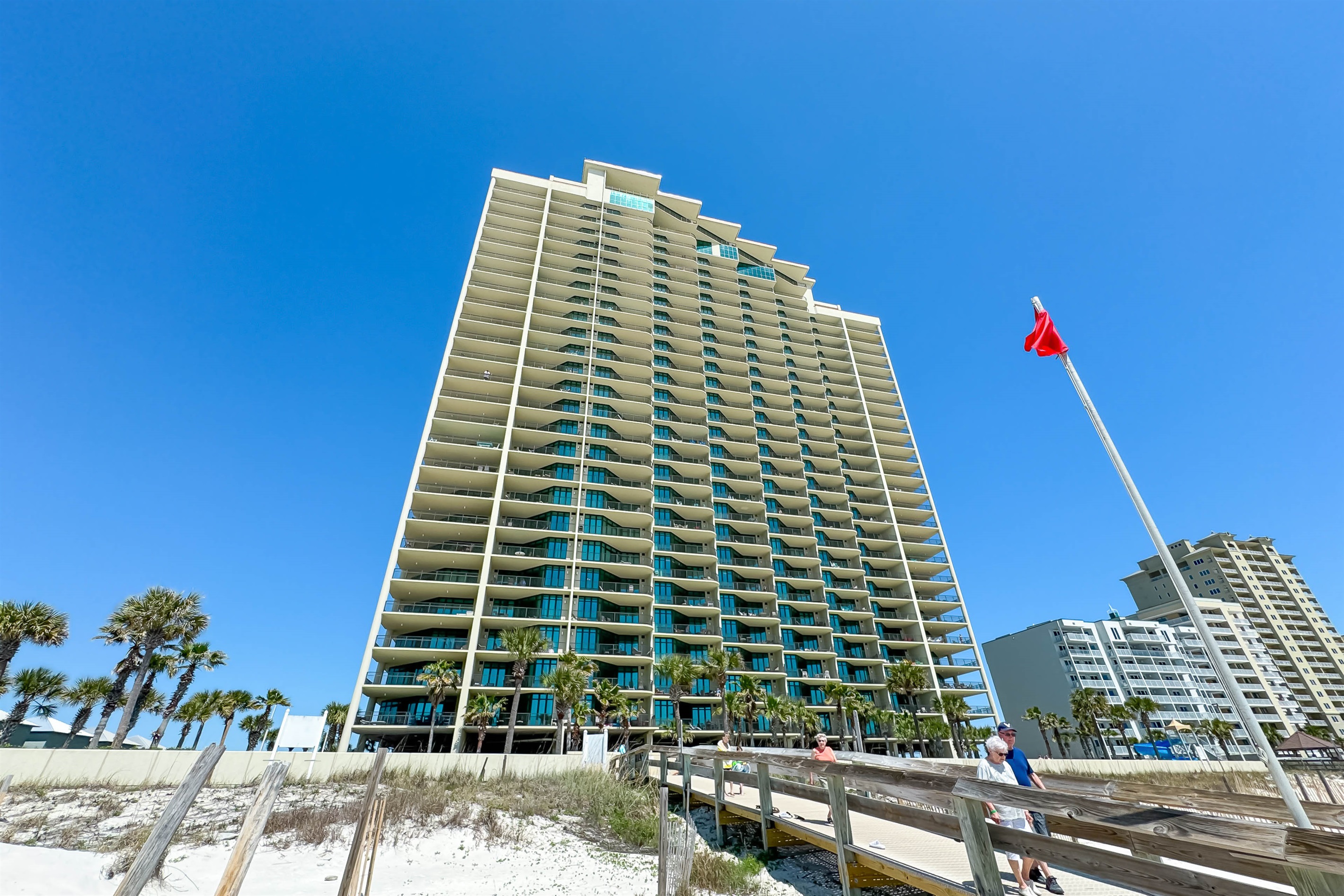 Your private path to paradise. Take a short stroll down our boardwalk and find yourself on the pristine shores of Orange Beach.